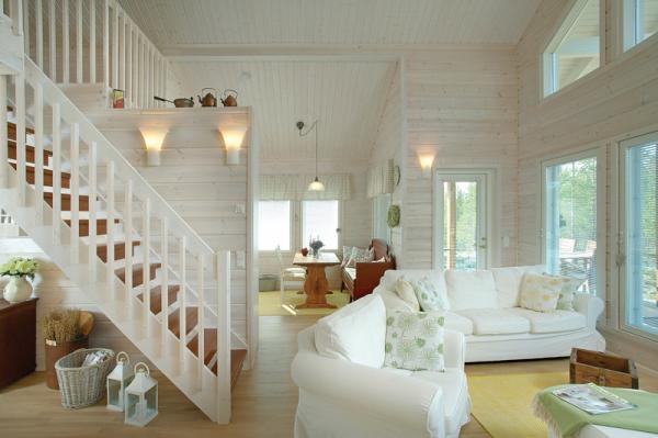 White painted straight stairs with stained steps
